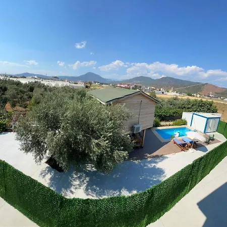Дом отдыха Fascinating Bungalow With Shared Pool Surrounded By Nature In